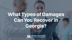 medical doctor and a Georgia car accident victim reviewing a medical scan. Large, bold white text overlays the center reading, "What Types of Damages Can You Recover in Georgia?"